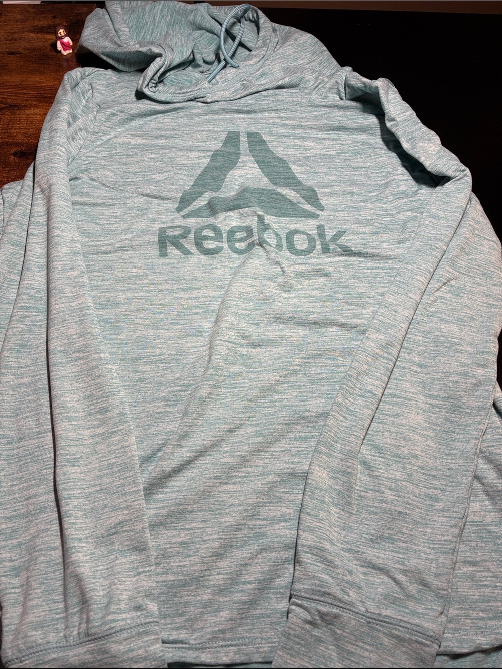 Reebok Women’s Heather Teal Pullover Hoodie with Logo